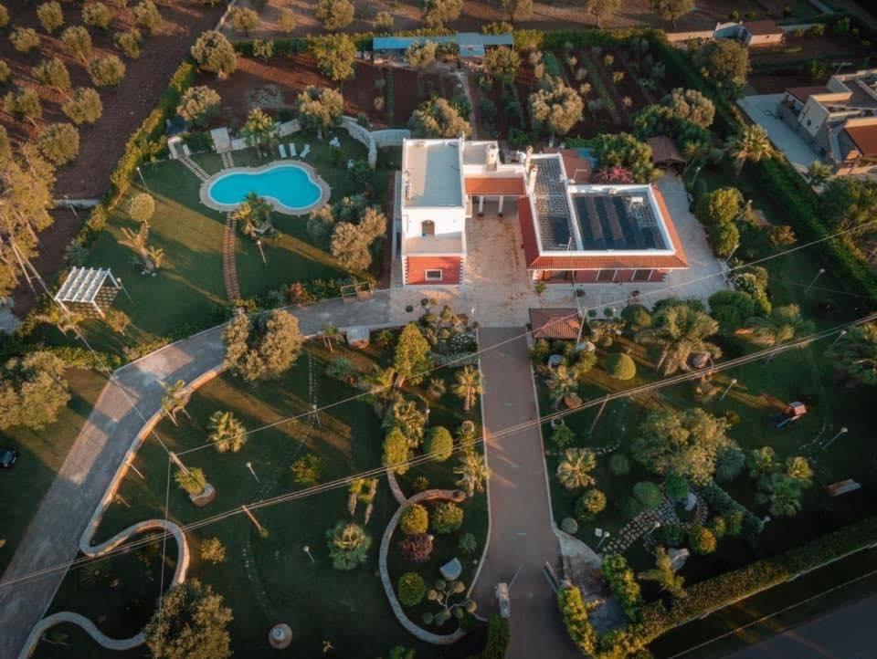an overhead view of a park with a building at Villa Mamma Grazia Rooms in San Vito dei Normanni