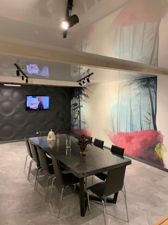 TV a/nebo společenská místnost v ubytování Loft wood