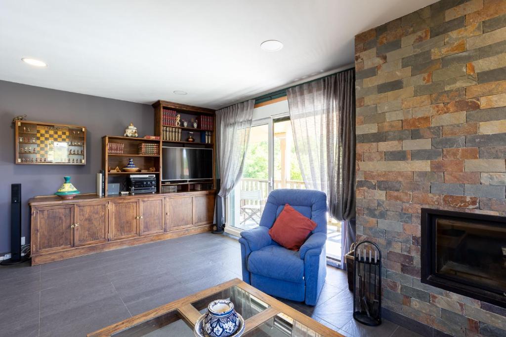 Posezení v ubytování LE LLAR casa con 2 PISCINAS 1 CLIMATIZADA INTERIOR muy cerca de Santiago de Compostela