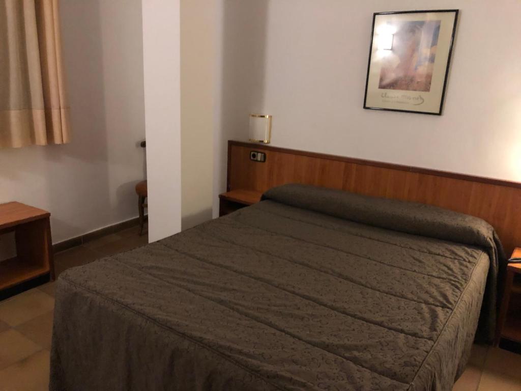 Postel nebo postele na pokoji v ubytování Hotel Refugi dels Isards