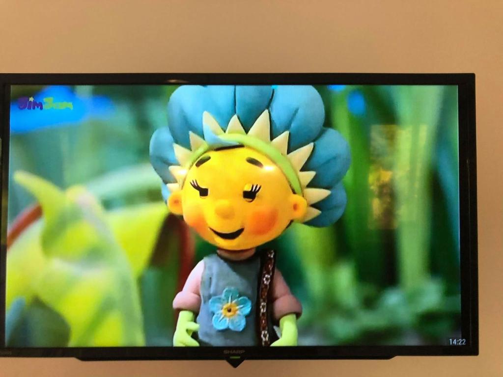 TV a/nebo společenská místnost v ubytování Mirella Villa Ocean View Villa