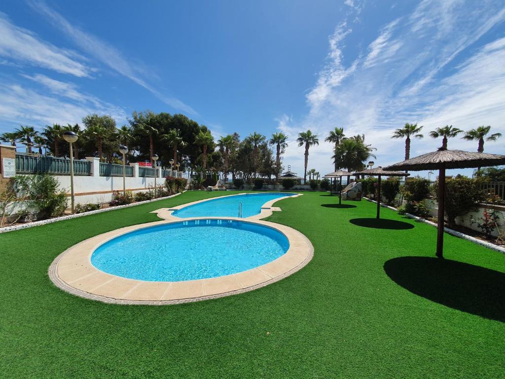 Bazén v ubytovaní Apartamento Acapulco Holiday alebo v jeho blízkosti