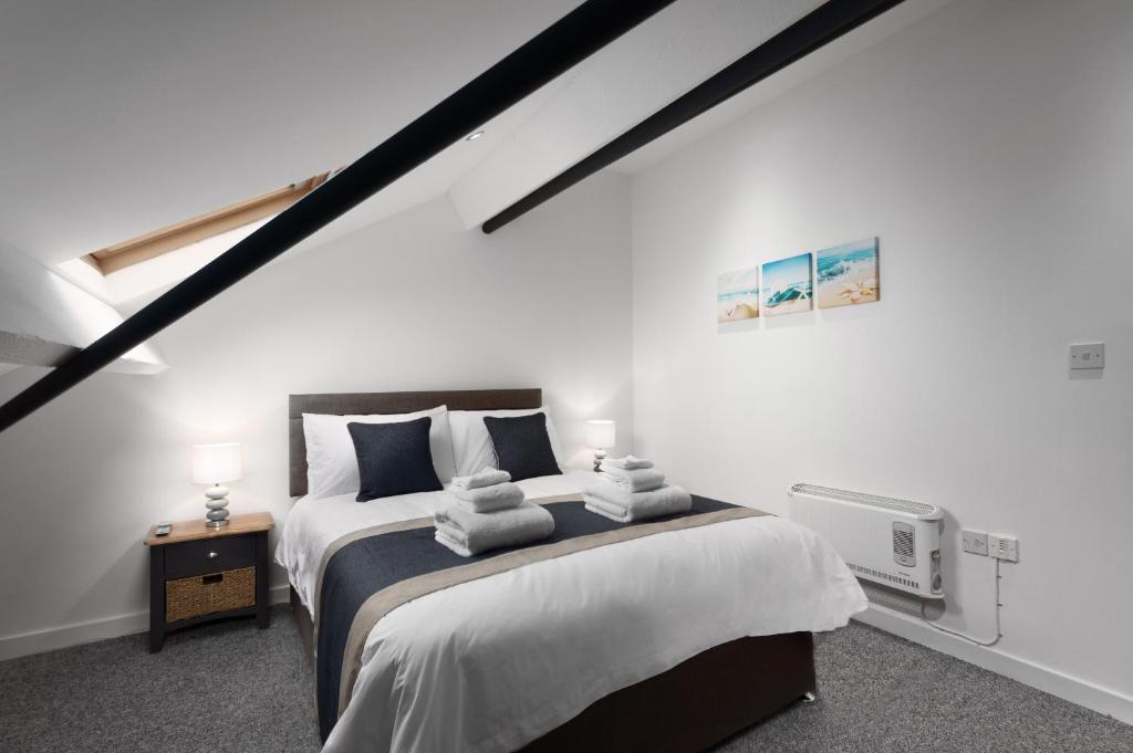 Postel nebo postele na pokoji v ubytování McLaren House Seahouses