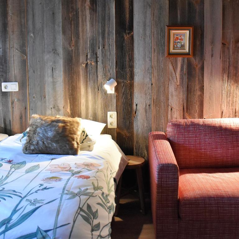 Postel nebo postele na pokoji v ubytování B&B Stefans Pottery