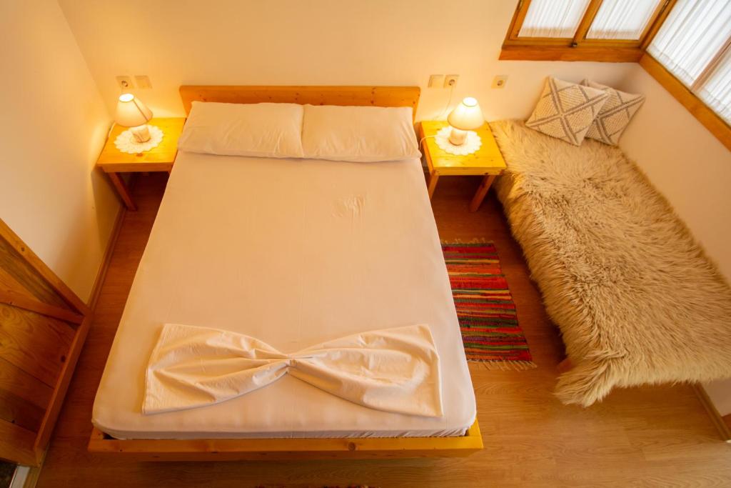 Voodi või voodid majutusasutuse TeArra GuestHouse toas