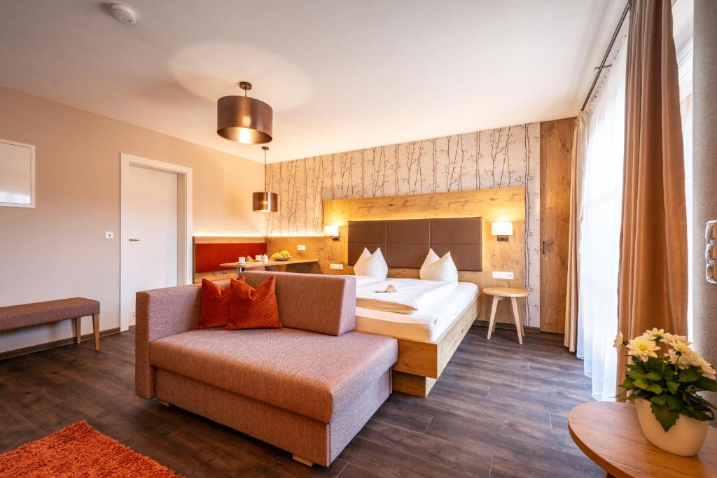 Postel nebo postele na pokoji v ubytování Boutique Hotel Angerer