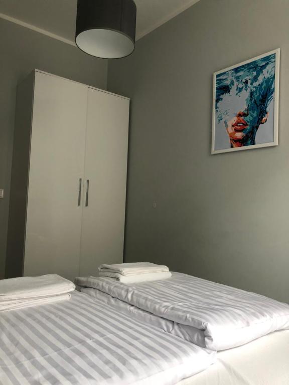 Posteľ alebo postele v izbe v ubytovaní Baltic Blue Apartamenty Pobierowo