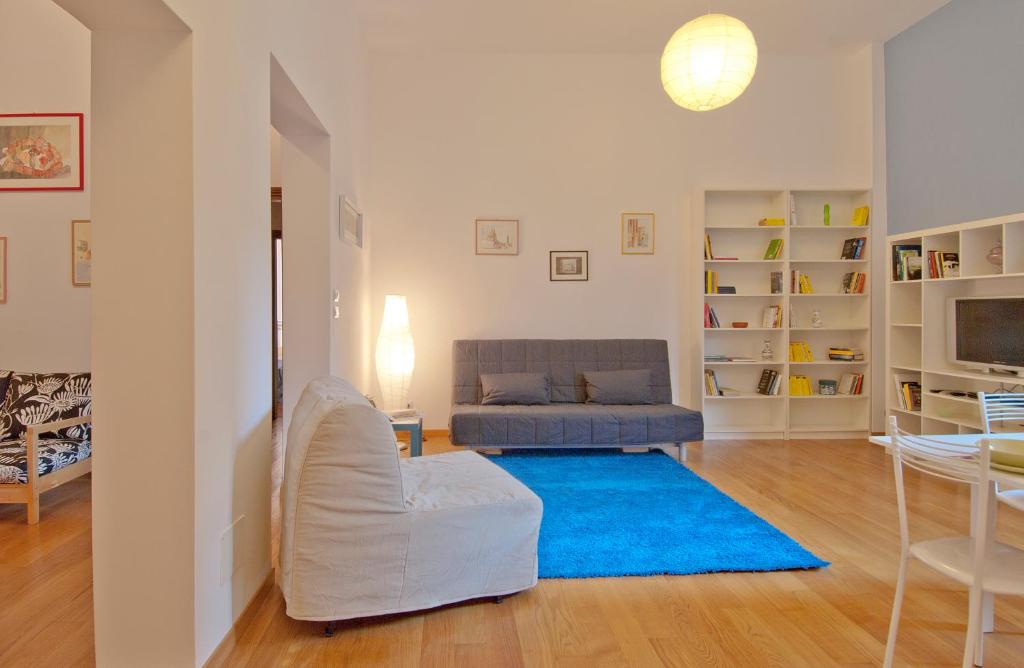 Televízia a/alebo spoločenská miestnosť v ubytovaní GetTheKey Battisti Apartment