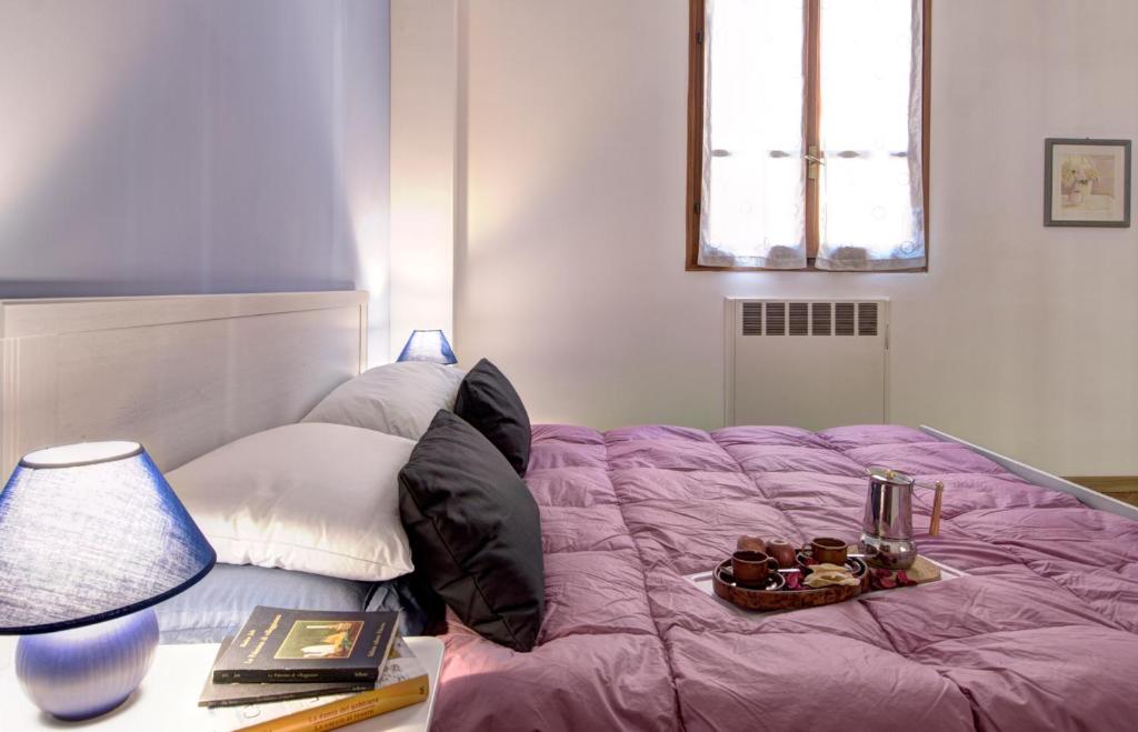 Posteľ alebo postele v izbe v ubytovaní GetTheKey Battisti Apartment