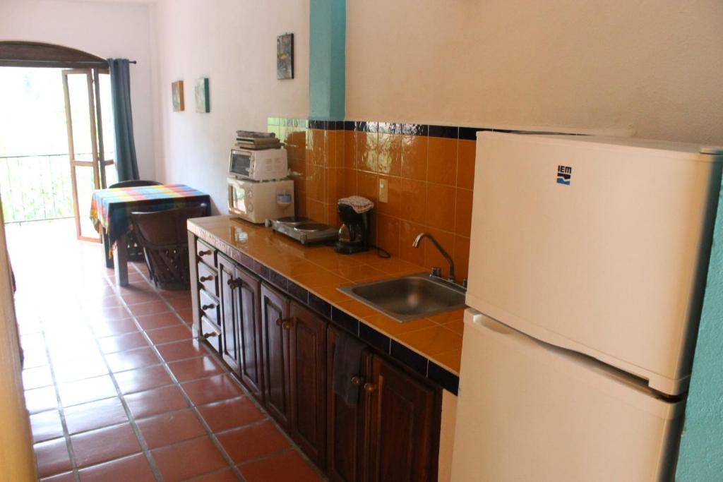Kuchyň nebo kuchyňský kout v ubytování La Posada Pacifica