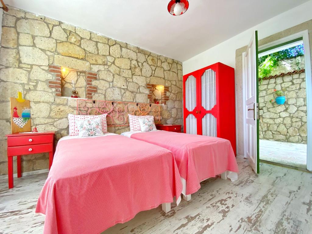 Postel nebo postele na pokoji v ubytování Kesre Hotel