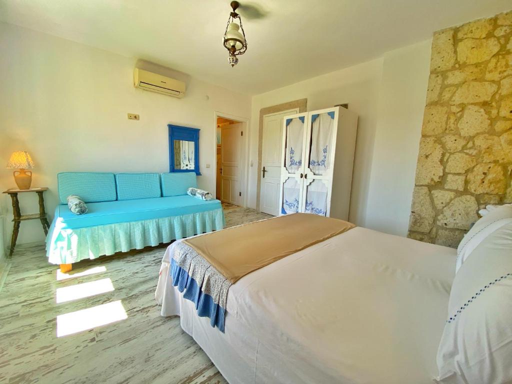 Postel nebo postele na pokoji v ubytování Kesre Hotel