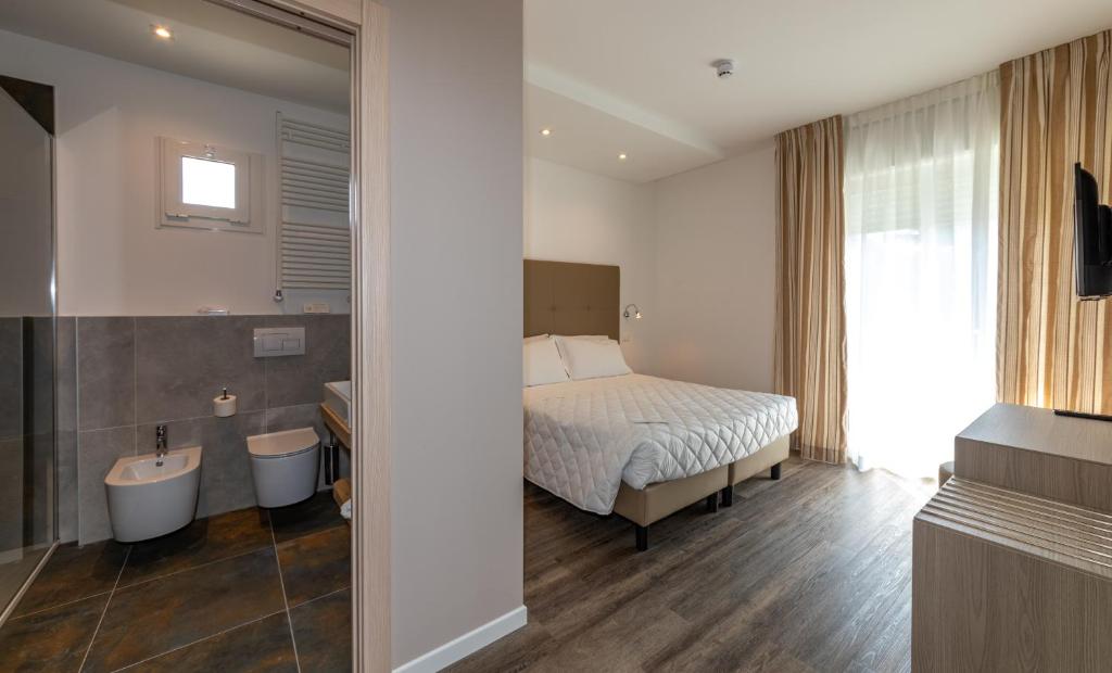 Postel nebo postele na pokoji v ubytování Hotel Mayer
