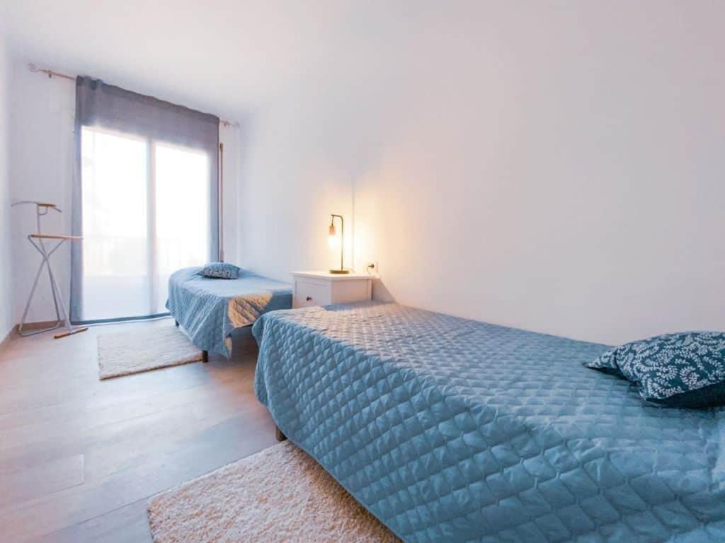 Posteľ alebo postele v izbe v ubytovaní Apartamento a 1 minuto de la playa