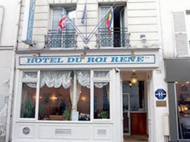 a hotel do not renew sign in front of a building at Hôtel Roi René in Paris