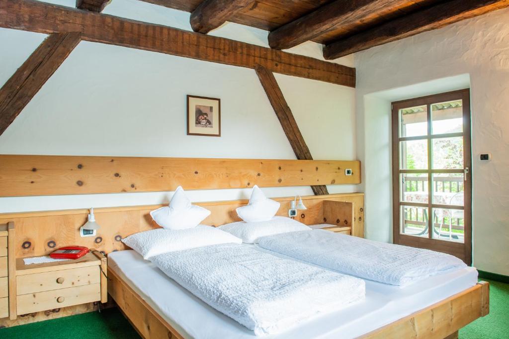 Postel nebo postele na pokoji v ubytování B&B Unterhabsbergerhof