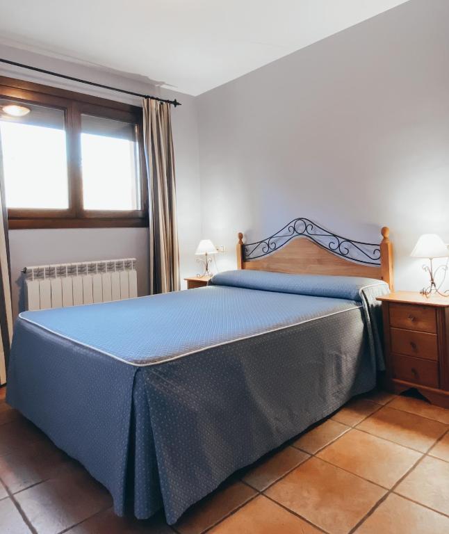 Postel nebo postele na pokoji v ubytování Hotel Valdevécar
