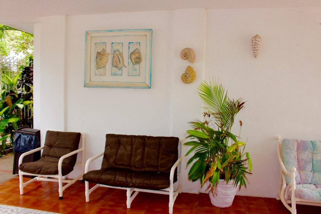 Posezení v ubytování Hotel y Suites Corita