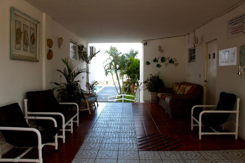 Posezení v ubytování Hotel y Suites Corita