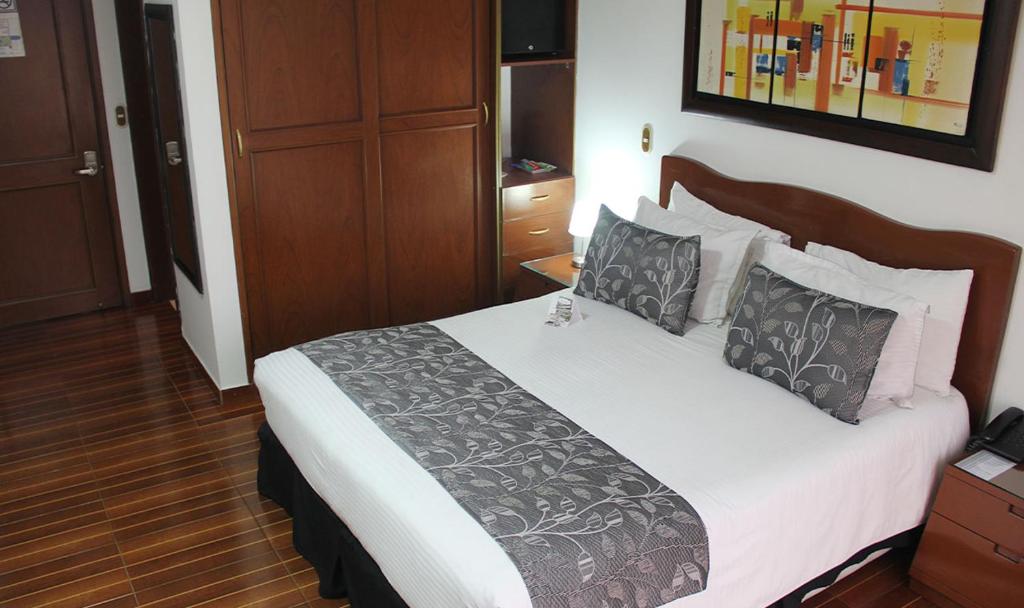Postel nebo postele na pokoji v ubytování AW Hotel Salitre Real