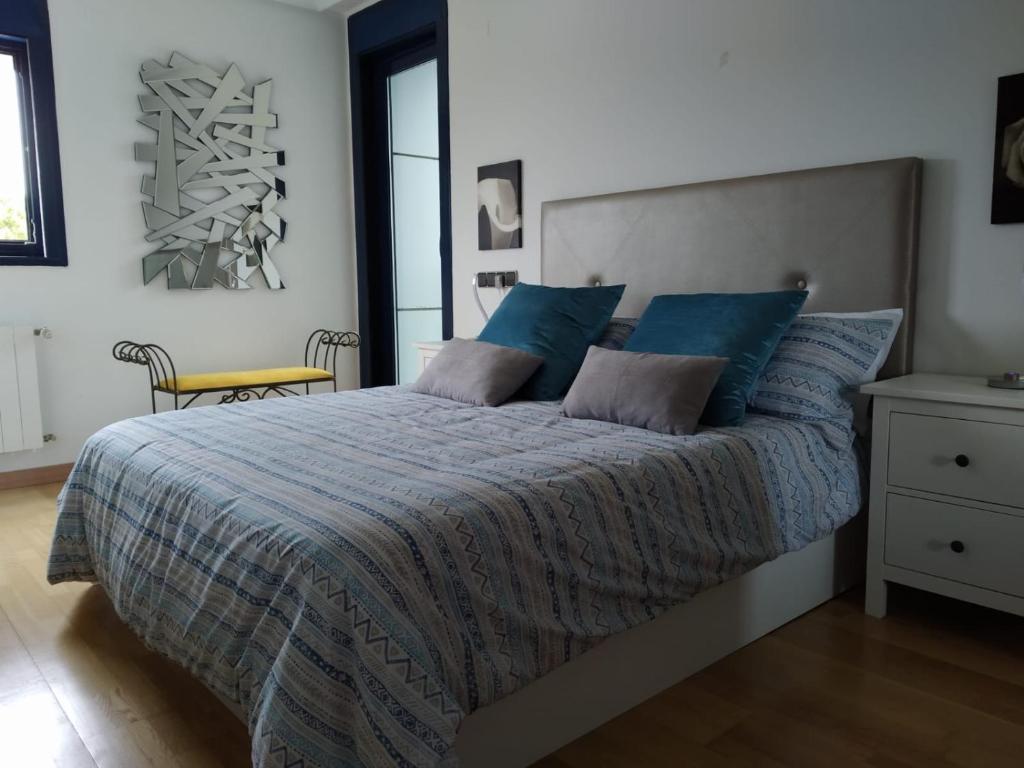 Postel nebo postele na pokoji v ubytování Olas Deluxe Salinas