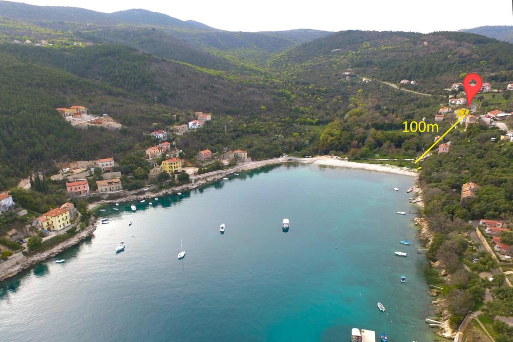 an aerial view of a body of water with boats at HAUS RITA in Labin