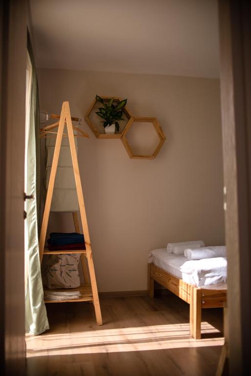 Postel nebo postele na pokoji v ubytování Cottages in Kaprovani "Family nest"