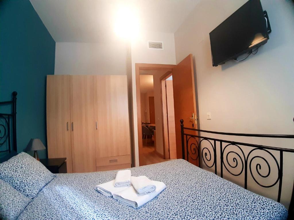 Posteľ alebo postele v izbe v ubytovaní Apartamento centro Málaga