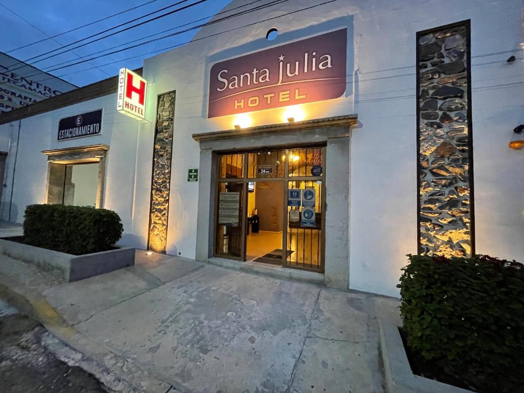 a santa lucia hotel with a sign over the door at Hotel Santa Julia in Tecamachalco