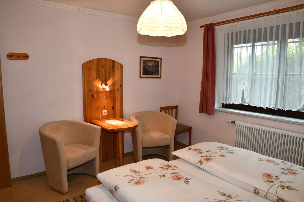 Posteľ alebo postele v izbe v ubytovaní Ferienwohnung Felix und Berta Pfeiffer-Vogl