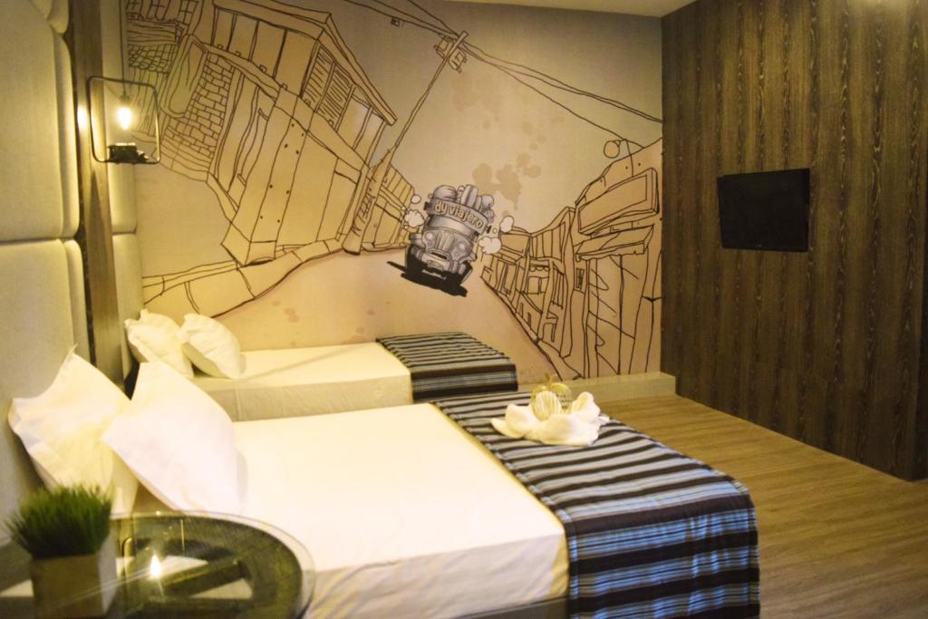 TV a/nebo společenská místnost v ubytování Dy Viajero Transient Hotel