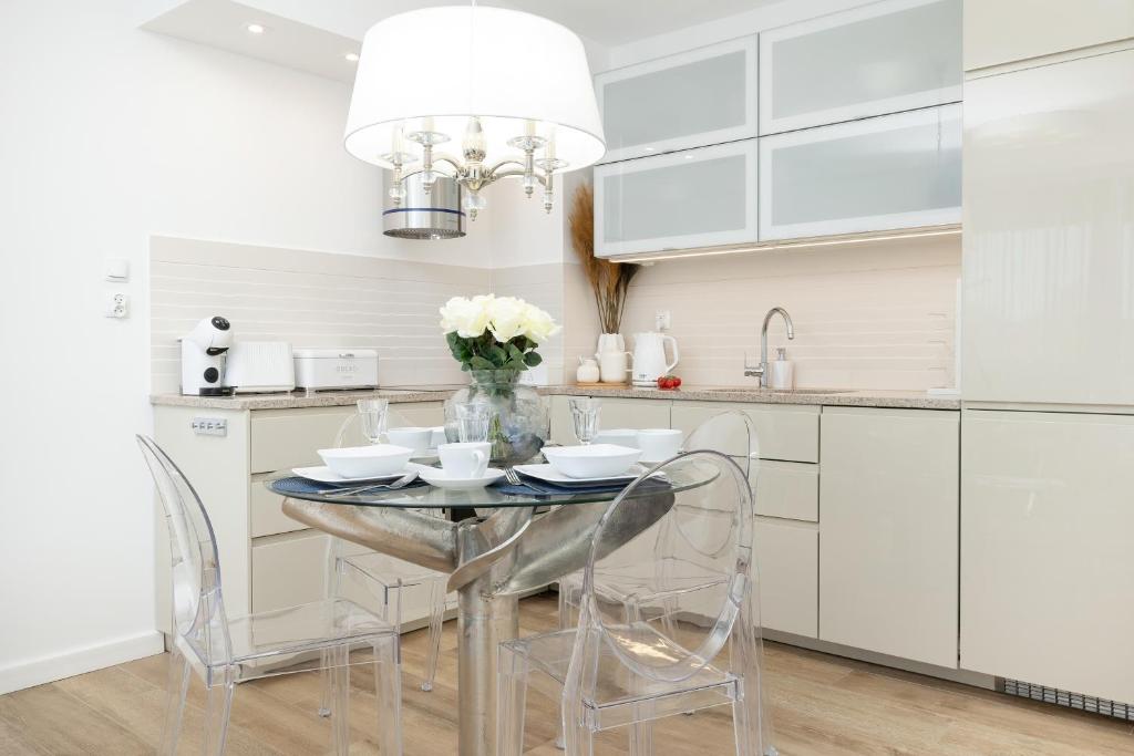 Kuchyň nebo kuchyňský kout v ubytování Baltini Premium Apartament Bliżej Morza