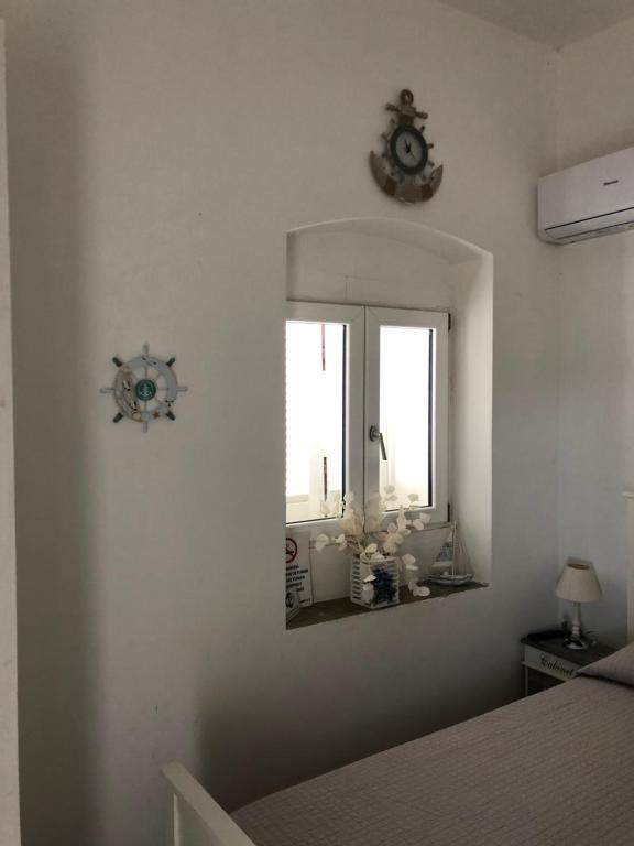Postel nebo postele na pokoji v ubytování Il Principe del mare B&B