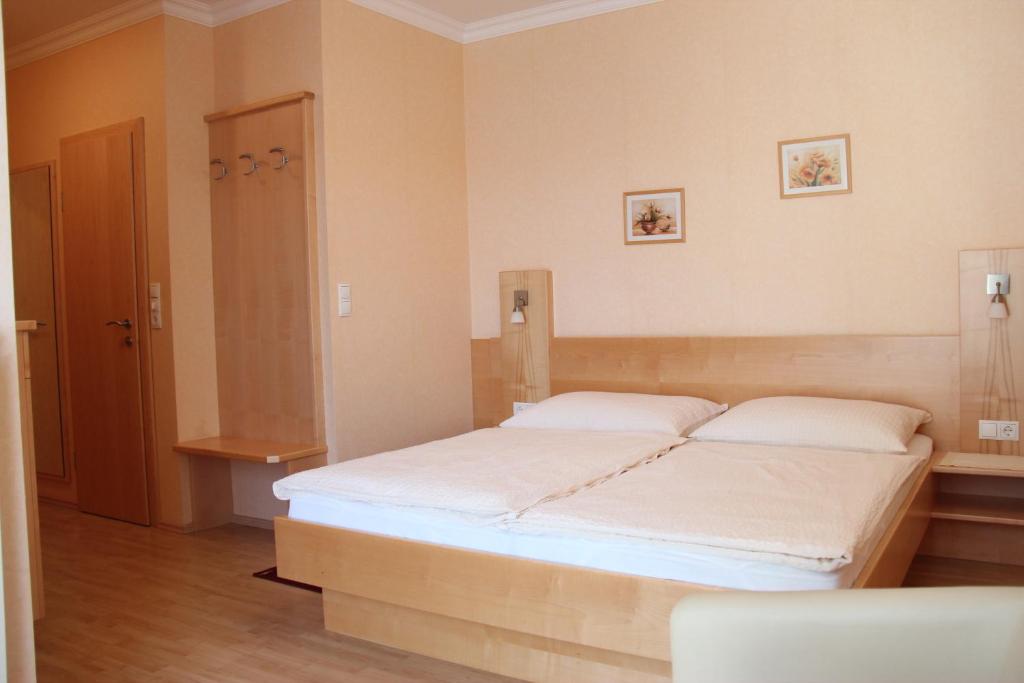 Postel nebo postele na pokoji v ubytování Haus Renée