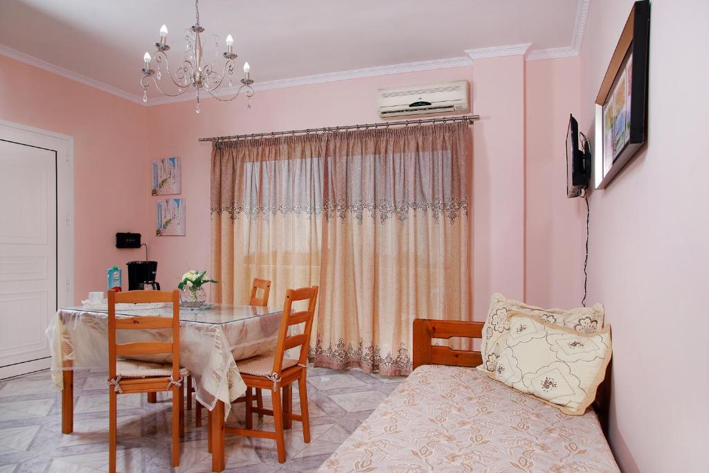 TV a/nebo společenská místnost v ubytování Alexandra