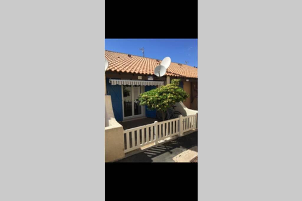 a view from the balcony of a house at Maisonnette climatisée dans résidence naturiste in Leucate