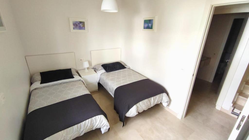 Posteľ alebo postele v izbe v ubytovaní Valle Romano Golf Resort Estepona