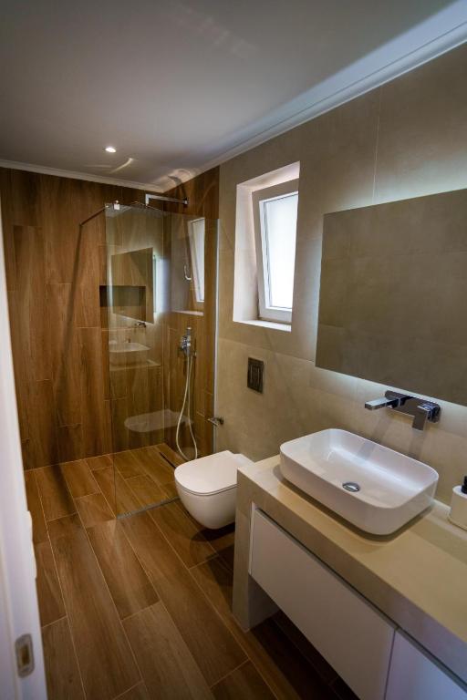Koupelna v ubytování Astrali Stone Villas