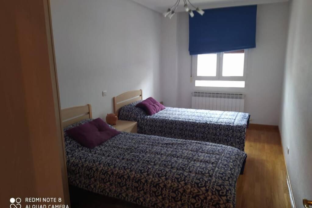 Postel nebo postele na pokoji v ubytování Vivienda Briviesca La Vega 2
