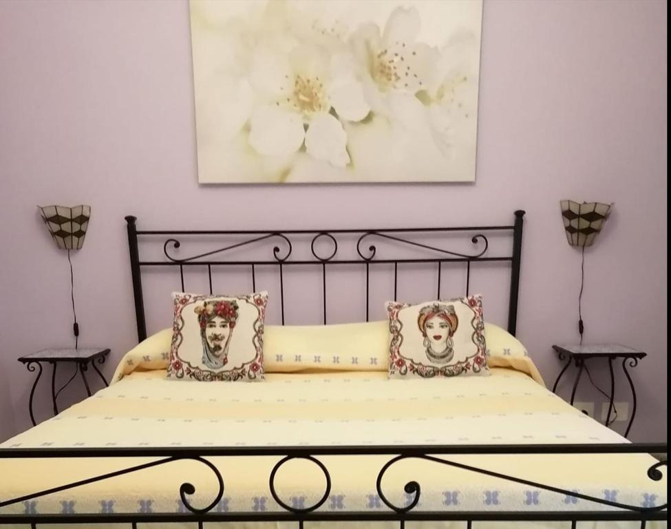 Säng eller sängar i ett rum på Casa Albigiò