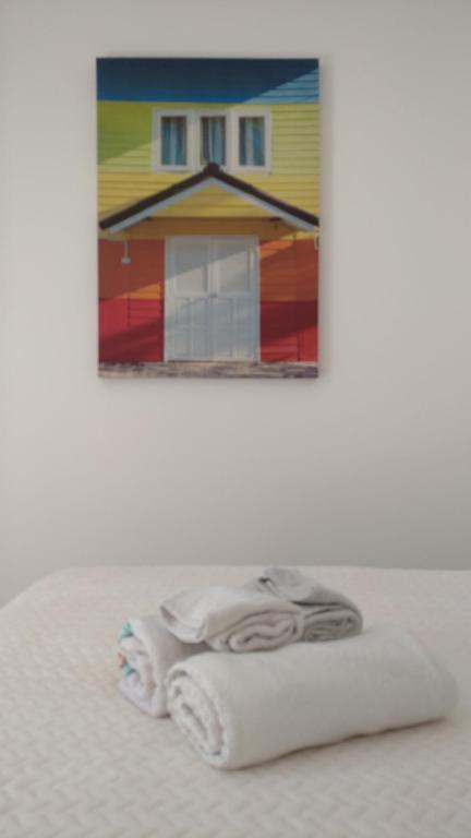 Postel nebo postele na pokoji v ubytování Elegantemare apartment