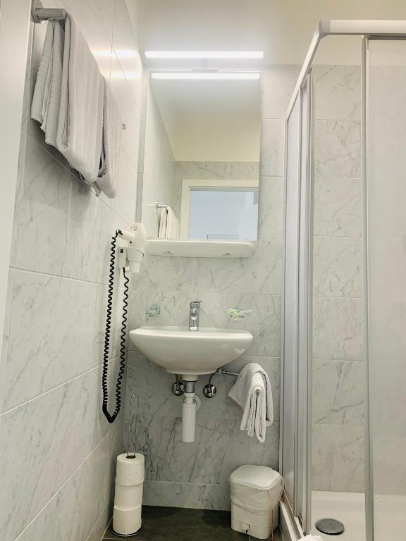 Kylpyhuone majoituspaikassa Hotel Gamper