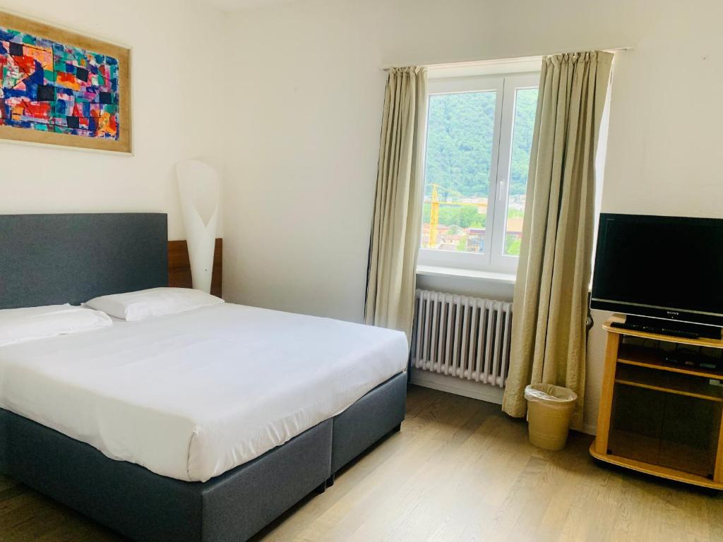 Vuode tai vuoteita majoituspaikassa Hotel Gamper