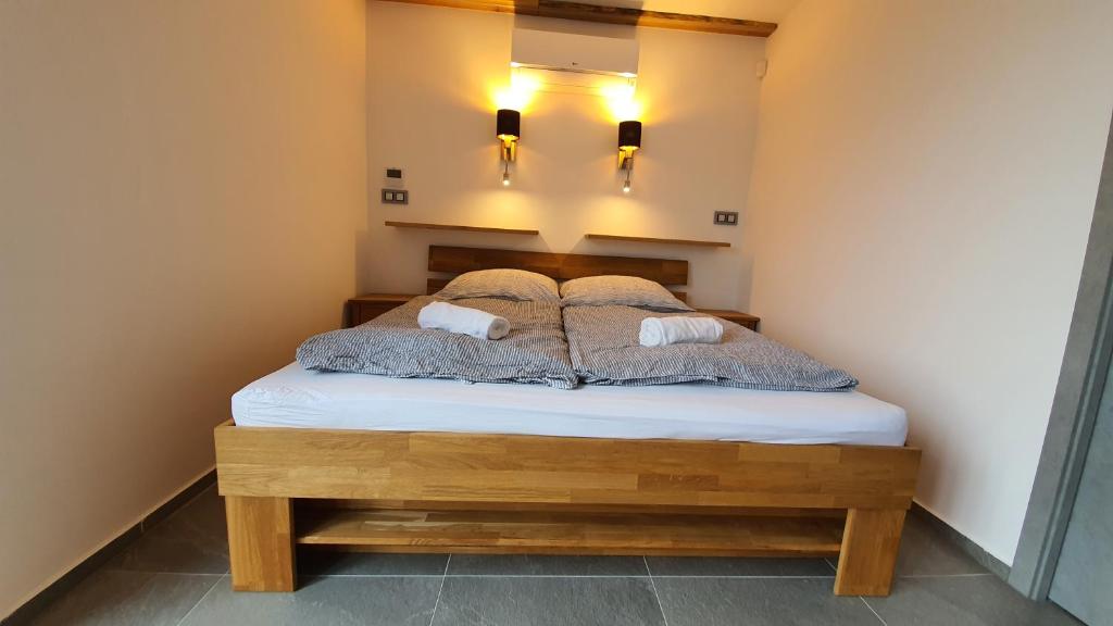 Postel nebo postele na pokoji v ubytování Magic Apartment centre mezonet