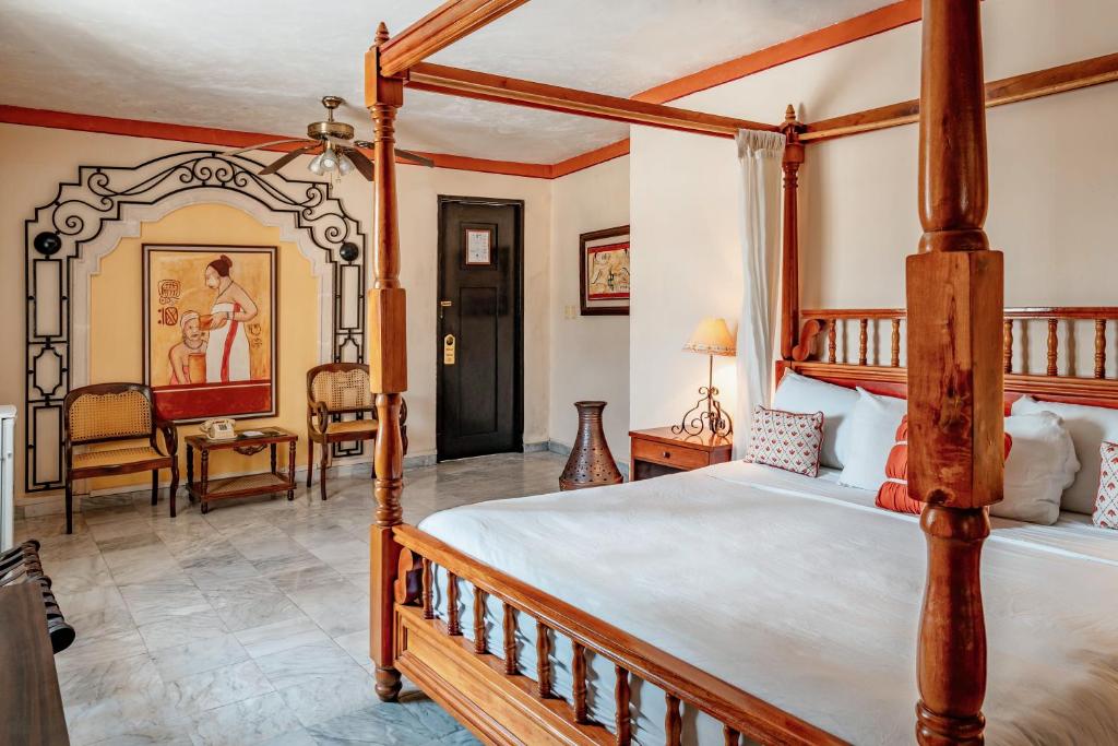 Postel nebo postele na pokoji v ubytování Casa del Balam Merida