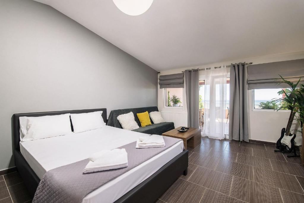 Posteľ alebo postele v izbe v ubytovaní Level 3 Sea View Studio