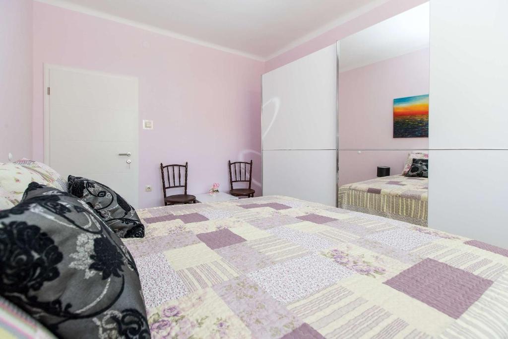 Postel nebo postele na pokoji v ubytování ANVEDOR