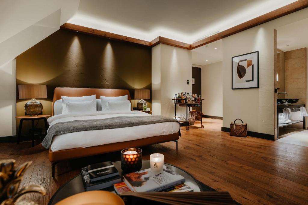 Postel nebo postele na pokoji v ubytování DO & CO Hotel München