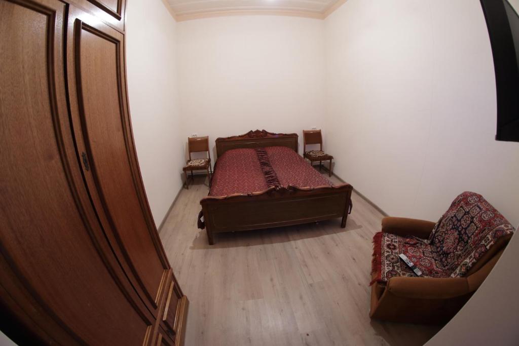 Postel nebo postele na pokoji v ubytování Vanand Guest House