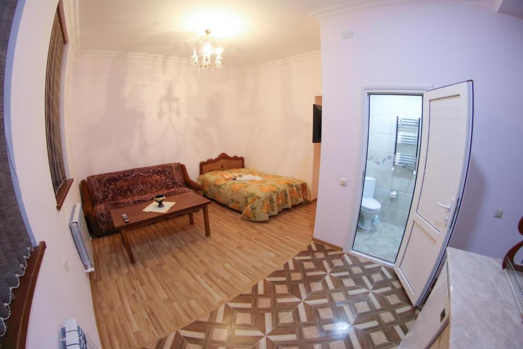 Postel nebo postele na pokoji v ubytování Vanand Guest House
